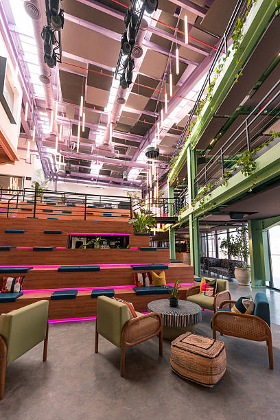 istock Modern Office Interior with Vibrant Seating and Indoor Greenery 2209151671