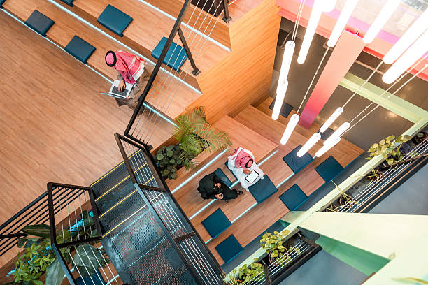istock Middle Eastern Business Executives Collaborating in Modern Vibrant Indoor Workspace 2209151790