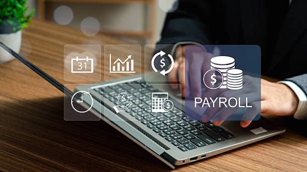 istock Payroll Management and Financial Processing System. payment of salaries to employees. Businessman works on payroll management with icons for payment, scheduling, and efficient payroll operations. 2209156505