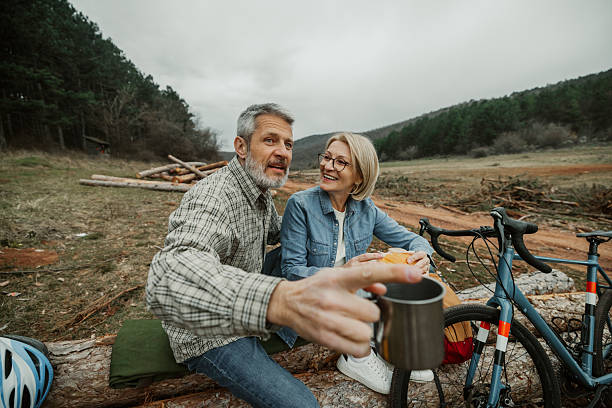 istock Cyclist couple having coffee and breakfast during outdoor break 2209156621