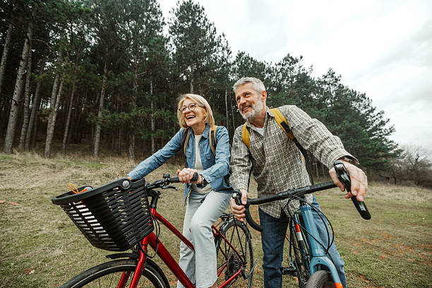istock Mature couple enjoying active lifestyle in forest ride 2209156867