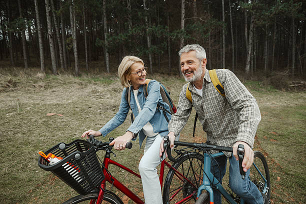 istock Mature couple enjoying active lifestyle in forest ride 2209157166
