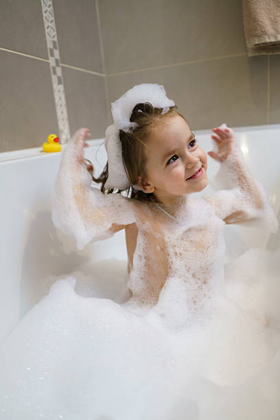 istock Girl enjoys a bubbly bath 2209162535