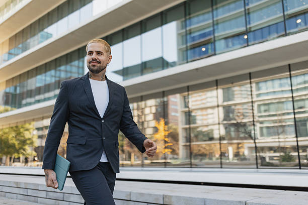 istock Charming man with a confident smile outdoors 2209164995