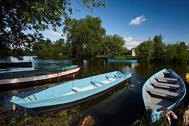 istock Wooden boats by river 2209167348