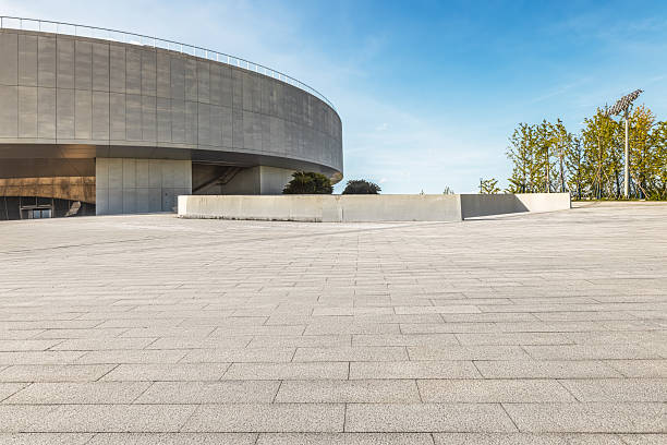 istock Modern city building and empty floor with blue sky background. 2209169465