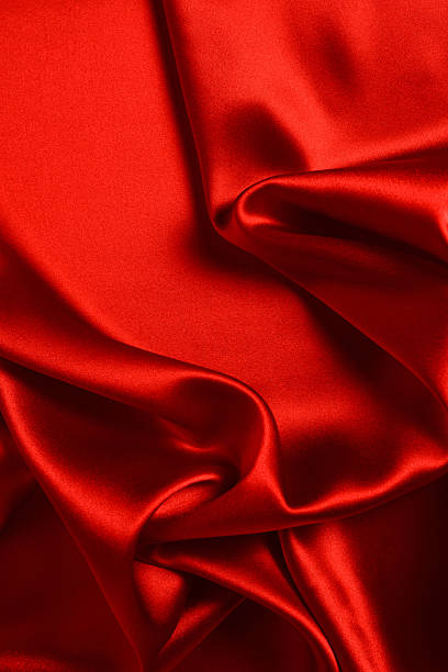 istock Red silk or satin luxury fabric texture can use as abstract background. Top view. 2209170500