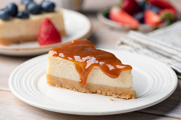 istock Cheesecake with salted caramel sauce topping 2209174907