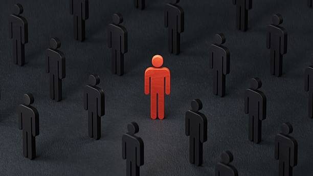 istock Crowd of figurines and red one. Difference and uniqueness concept.Perfect for representing business strategy, leadership, and management.3D rendering on black background. 2209176981