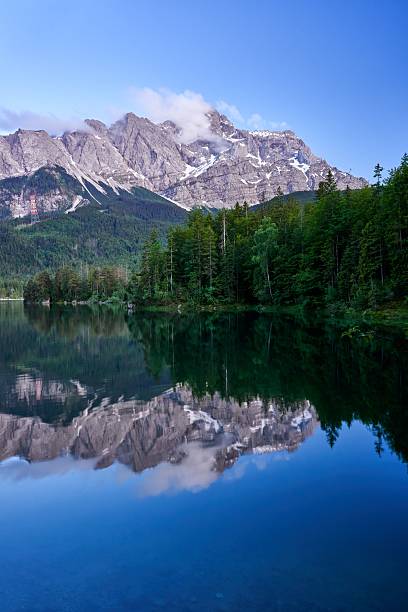 istock Stunning mountain landscape with lake reflection. 2209178517