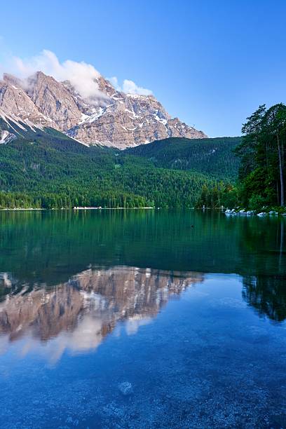istock Serene Mountain Landscape with Reflective Lake 2209178540