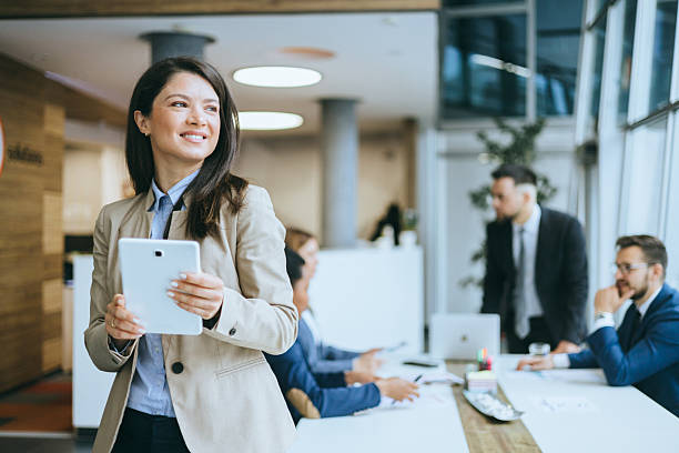 istock Confident businesswoman holding tablet 2209178898