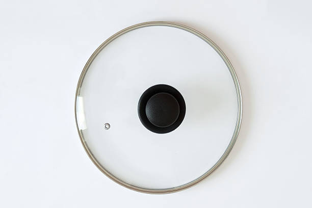istock Glass frying pan and saucepan lid with black handle. White background. 2209179300