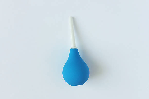 istock Rubber bulb syringe  Blue color. White background. 2209179315