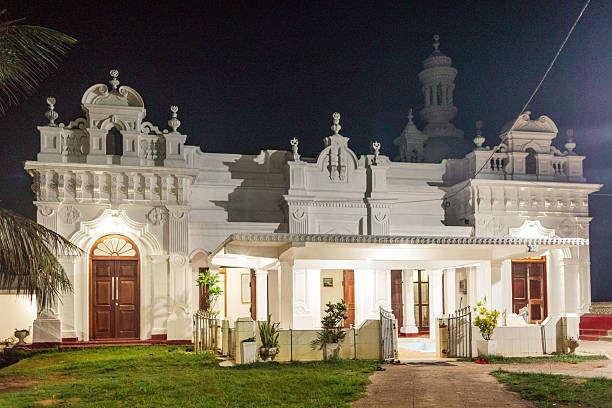 Ornate Ketchimale Mosque glowing under night sky, showcasing intricate architecture and peaceful ambiance, Beruwala, Sri Lanka