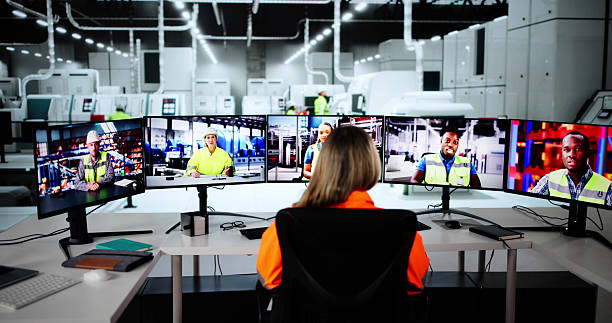 istock Female Executive Leading Factory Staff 2209182603