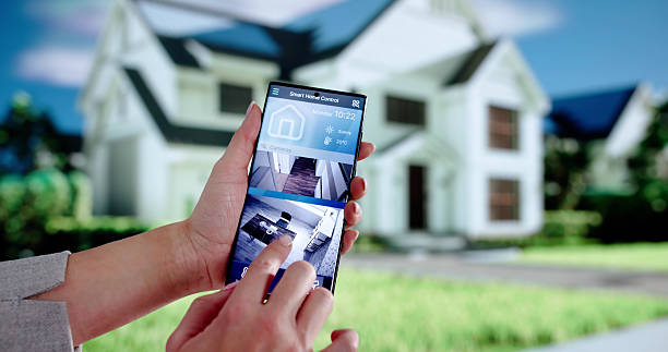 istock Female Security Guard Monitors Smart House CCTV System 2209182733