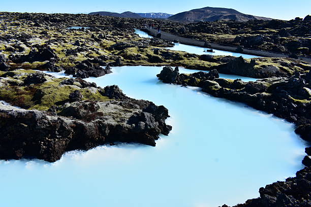 A mesmerizing journey inside an ice cave in Iceland, where glowing blue walls of crystal-clear ice create a surreal, dreamlike atmosphere. Formed beneath massive glaciers like Vatnajökull, these natural wonders change shape each season as meltwater carves magical tunnels and chambers. Perfect for adventure footage, travel content, or cinematic visuals showcasing Iceland’s frozen beauty.