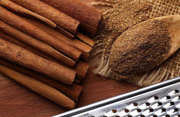 cinnamon sticks and powder isolated on white background