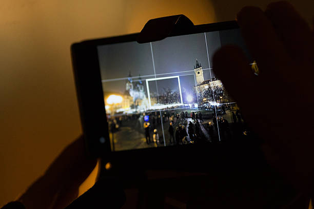 Close-Up of Smartphone in Hand at Night. Closeup smartphone held in a hand. Modern technology, emphasizing connectivity and the seamless integration of devices into everyday life.