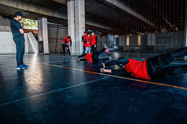 Visually impaired people during handball training at sport court
