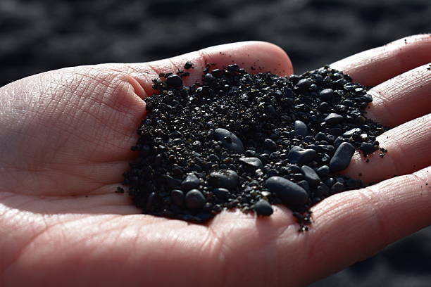 istock Icelandic Black Sand in Hands – Volcanic Beauty Up Close 2209186870