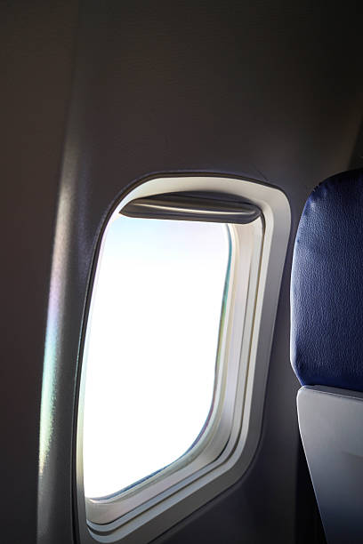 istock Airplane Window from Inside the Aircraft Cabin 2209187222