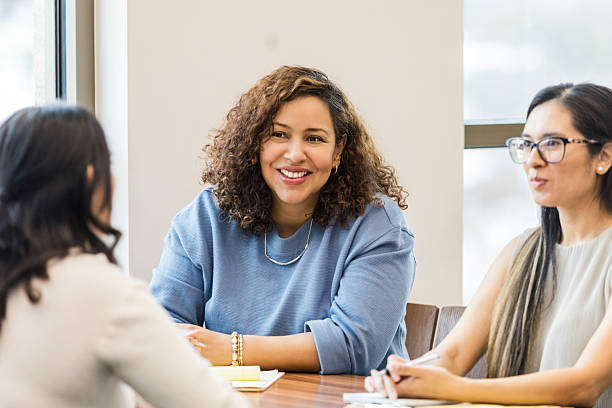 istock Multiracial Women in a Group Therapy Session 2209187587
