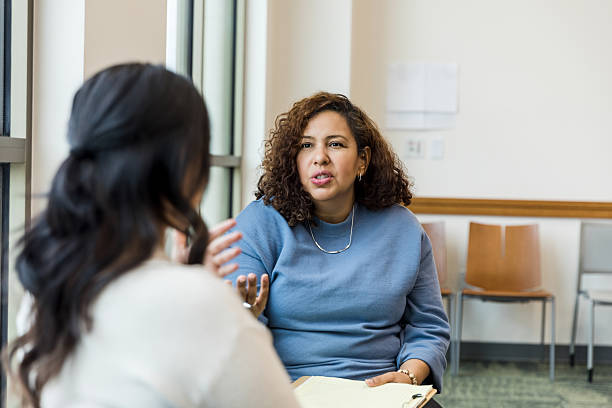 istock Mental Health Professional Providing Emotional Support During Group Therapy Session 2209187715
