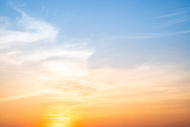 istock Beautiful , luxury soft gradient orange gold clouds and sunlight on the blue sky perfect for the background, take in evening,Twilight, Large size, high definition landscape photo 2209187954