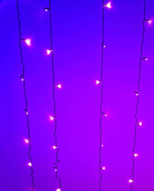 istock Close-up shot of a vibrant blue surface with twinkling lights 2209190376