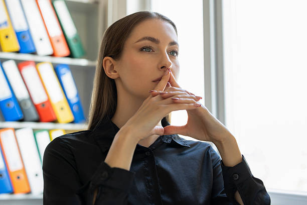 istock Businesswoman sitting and thinking 2209194873