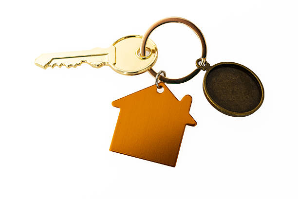 House key with a circle blank label on white background