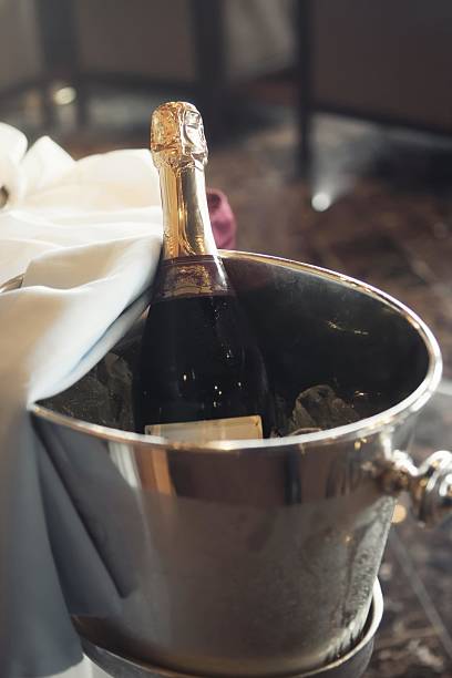 istock Chilled Champagne Bottle in Silver Ice Bucket 2209209047