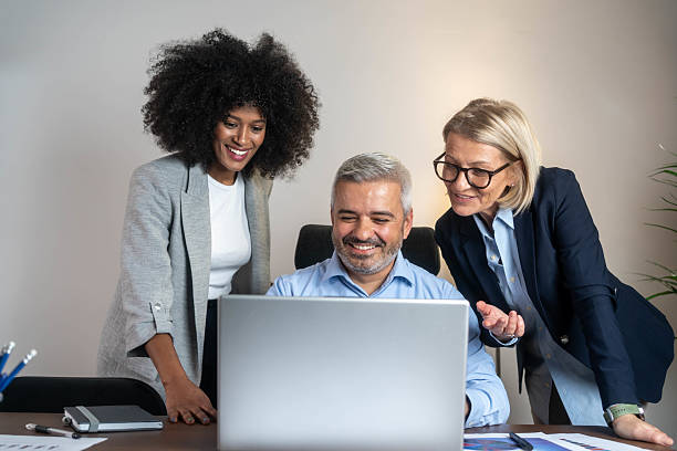 istock Successful group of businesspeople having a briefing 2209210386