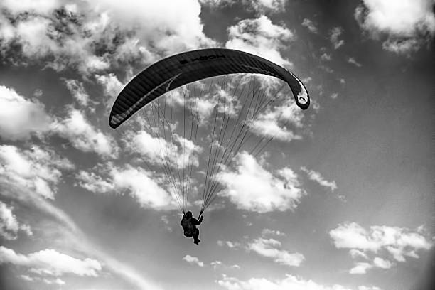 Mar del Plata , Buenos Aires , Argentina; 12-12-2022: Cloudscape Paraglider flying in the sky