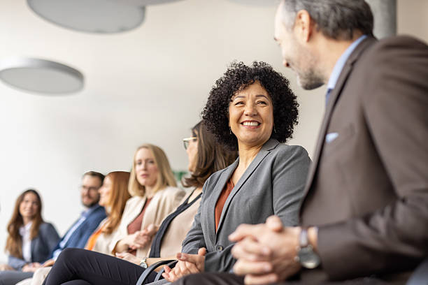 istock Joyful Business People Sharing Ideas During Collaboration 2209219832