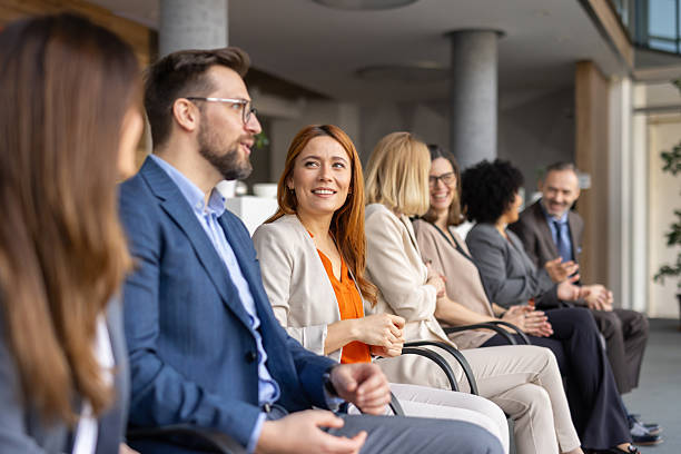 istock Professionals sharing insights in a modern space. 2209219835