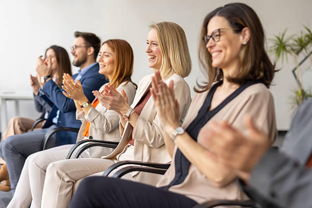 istock Cheerful Participants Clapping at a Professional Event 2209219836