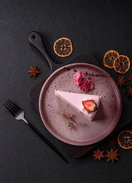 istock A slice of pink colored puff cake for a birthday celebration 2209226095