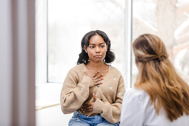 istock Young Woman Receiving Emotional Support During Therapy Session 2209226330