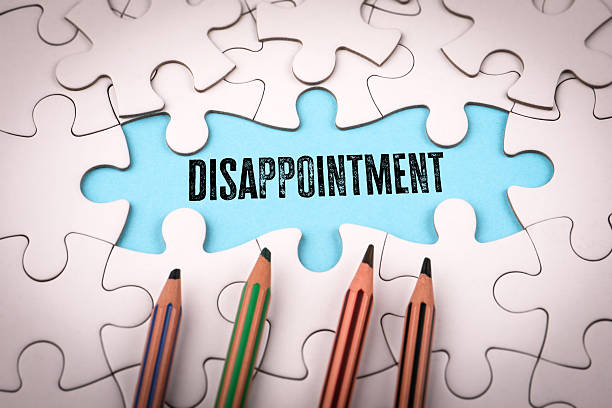 istock Disappointment Concept. White puzzle pieces and colored pencils 2209229739