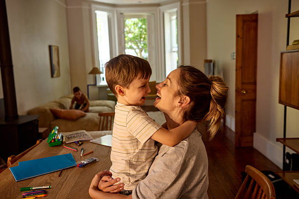 istock Mother and son sharing a tender moment at home 2209231439