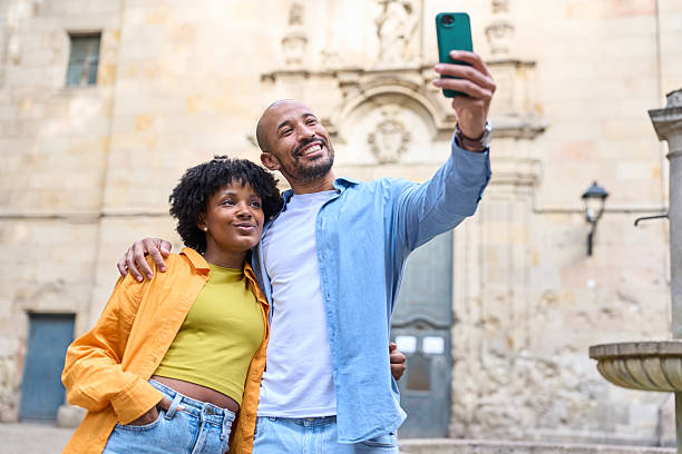 istock Tourists taking selfie in barcelona's gothic quarter 2209233295