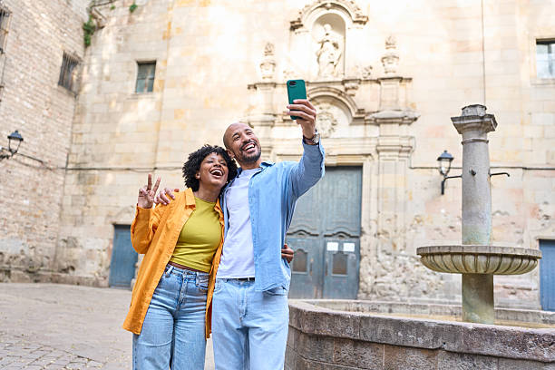 istock Tourists taking selfie in barcelona's gothic quarter 2209233300