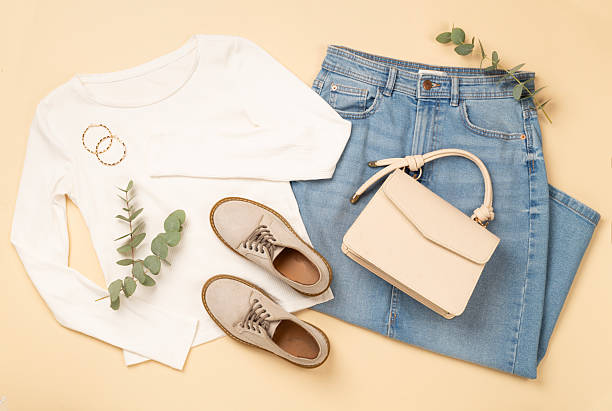 istock Flat lay with women's trendy spring outfit on beige background, top view 2209235326