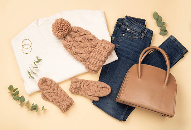 istock Flat lay with women's trendy spring outfit on beige background, top view 2209235327