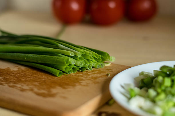 istock Leaf onion on the board appears fresh and rich 2209241569