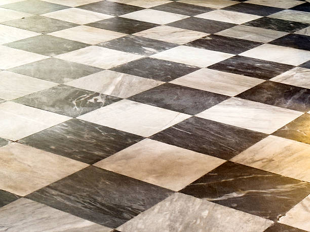 istock Checkered marble floor pattern with black and white tiles 2209245052