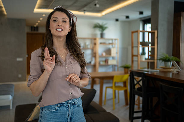 istock Influencer creating video content for social media in living room 2209250964